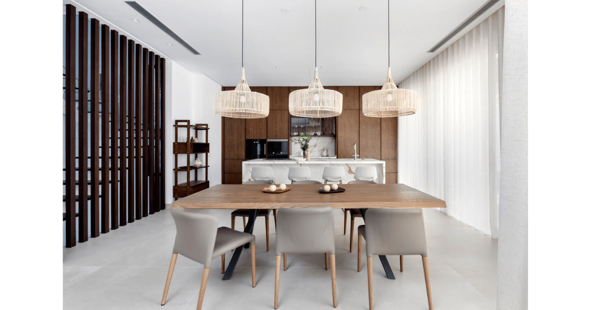 Dining area in T.Z. House, Tranquil Zen Villa by MORANID, featuring natural materials and warm textures, and wellness-centered interior design.