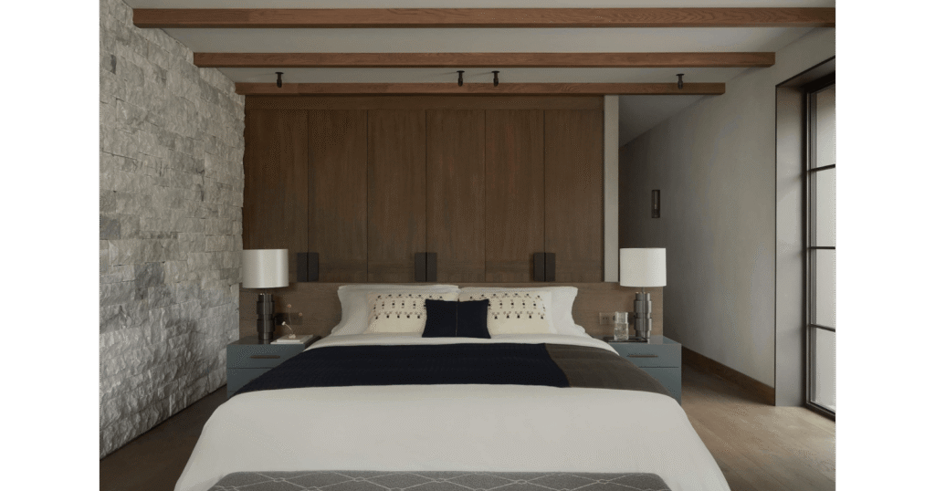Bedroom in D.L. House by MORANID, featuring wellness-centered light and refined illumination, and human-centered connection and flow.