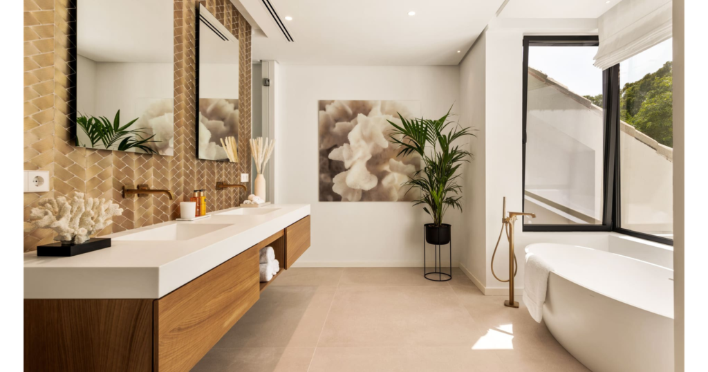 Bathroom in H.L. House by MORANID, featuring biophilic elements and natural materials, and natural materials and warm textures.