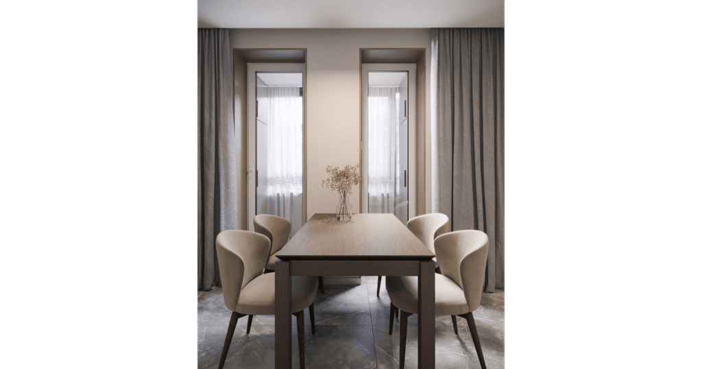 Dining area in D.Y. House by MORANID, featuring wellness-centered light and refined illumination.