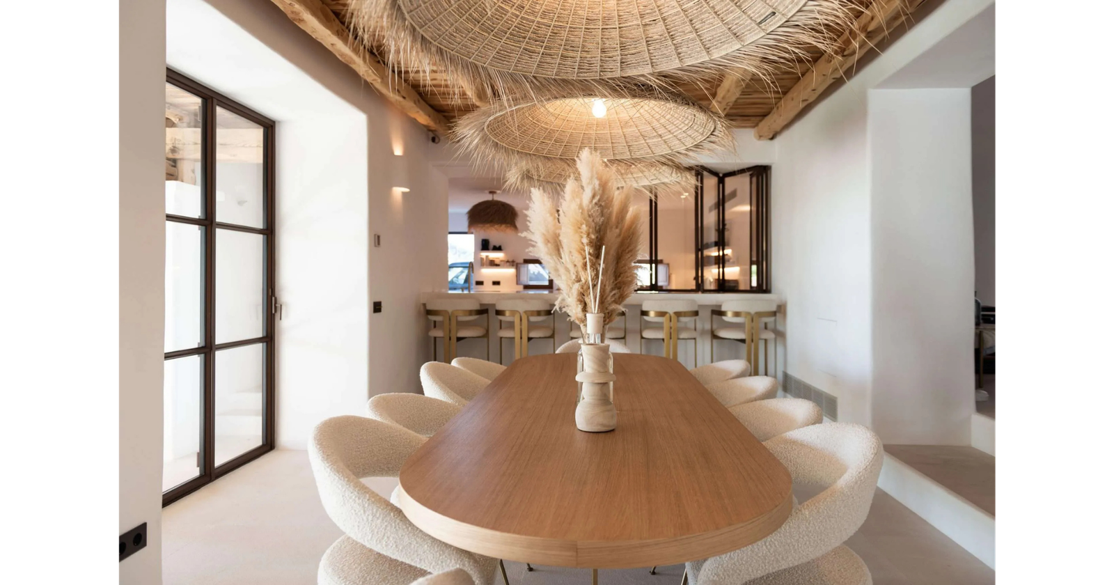 Dining area in O.S. Luxury Private Villa by MORANID, featuring wellness-centered light and refined illumination, and human-centered connection and flow.