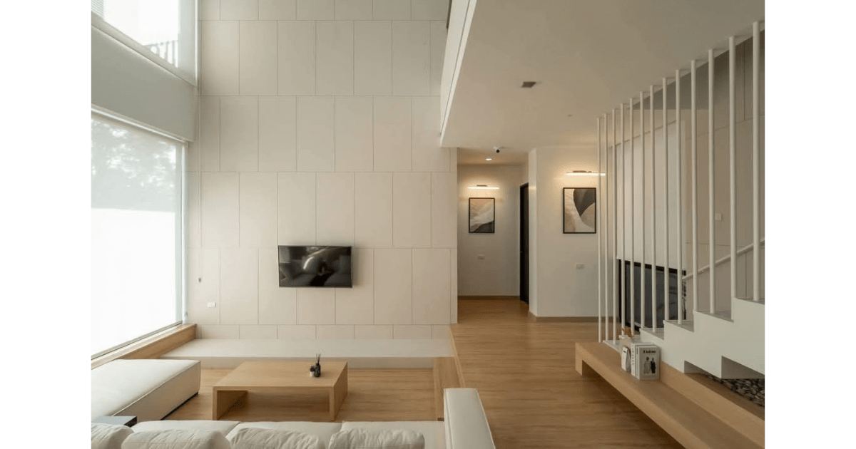 Living room in E.F. House, Earth & Flow Residence by MORANID, featuring human-centered connection and flow, and thoughtful movement and spatial flow.