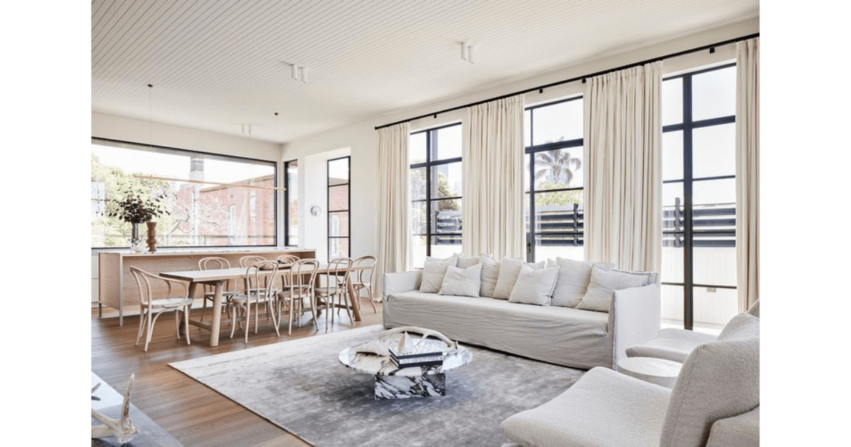 Living room in B.S. Nature-Inspired Villa by MORANID, featuring biophilic elements and natural materials, and thoughtful movement and spatial flow.