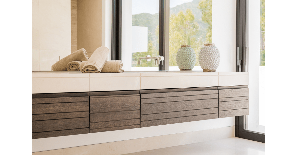 Bathroom in A.O. House, Arcos & Origins by MORANID, featuring natural materials and warm textures, and wellness-centered interior design.
