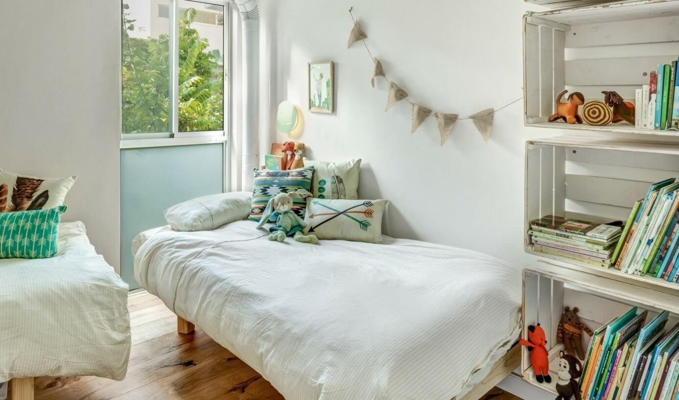 Children’s room of I.L.HOUSE in I.L. House by MORANID, featuring human-centered residential design and refined material balance.