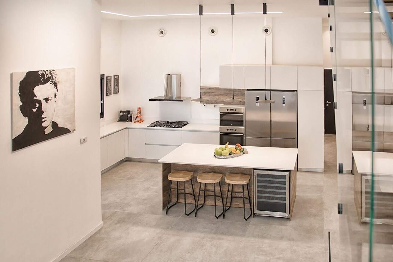 Kitchen in D.M. House by MORANID, featuring human-centered residential design and refined material balance.