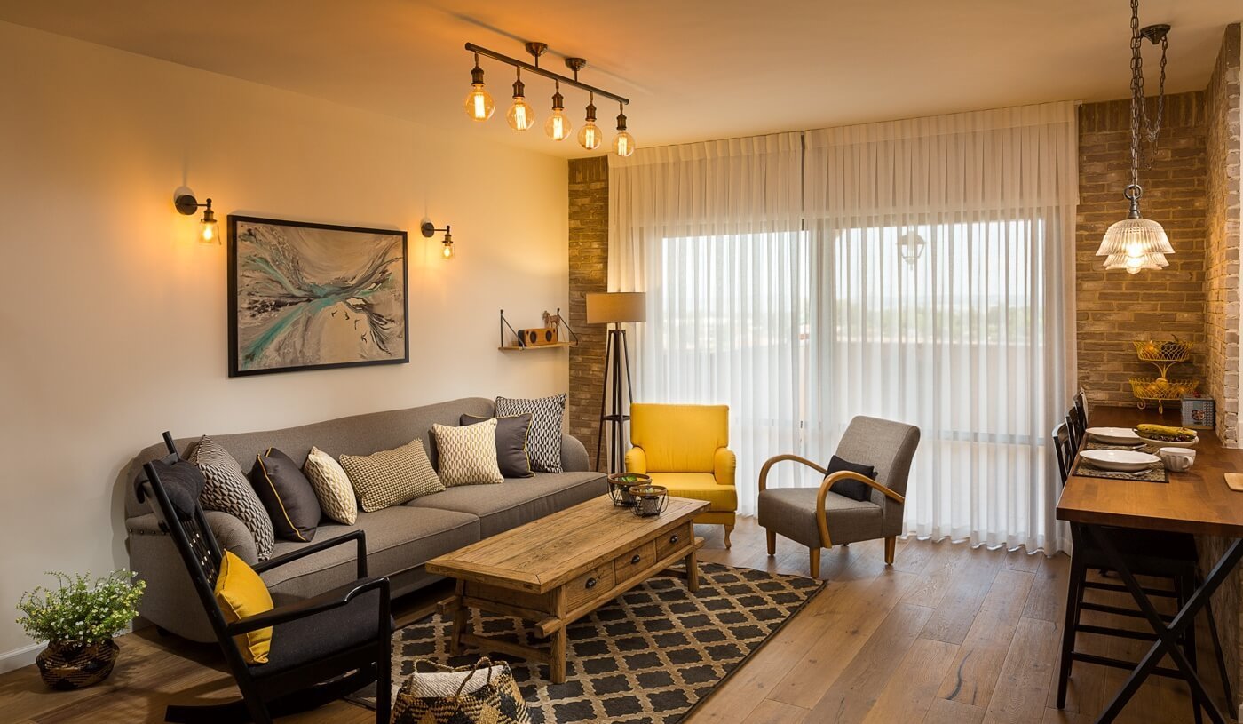 Living room in I.C. House by MORANID, featuring human-centered residential design and refined material balance.